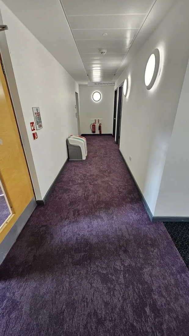 Office corridor cleaning near meeting rooms — commercial cleaning contract, Milton Keynes