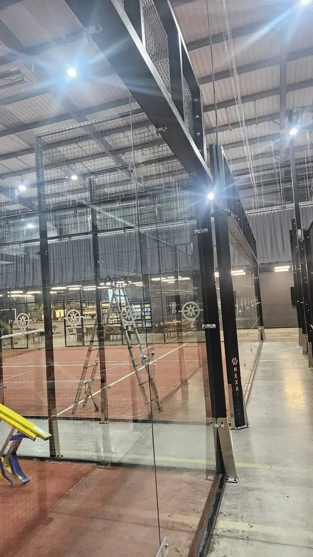 Sports facility glass partition cleaning